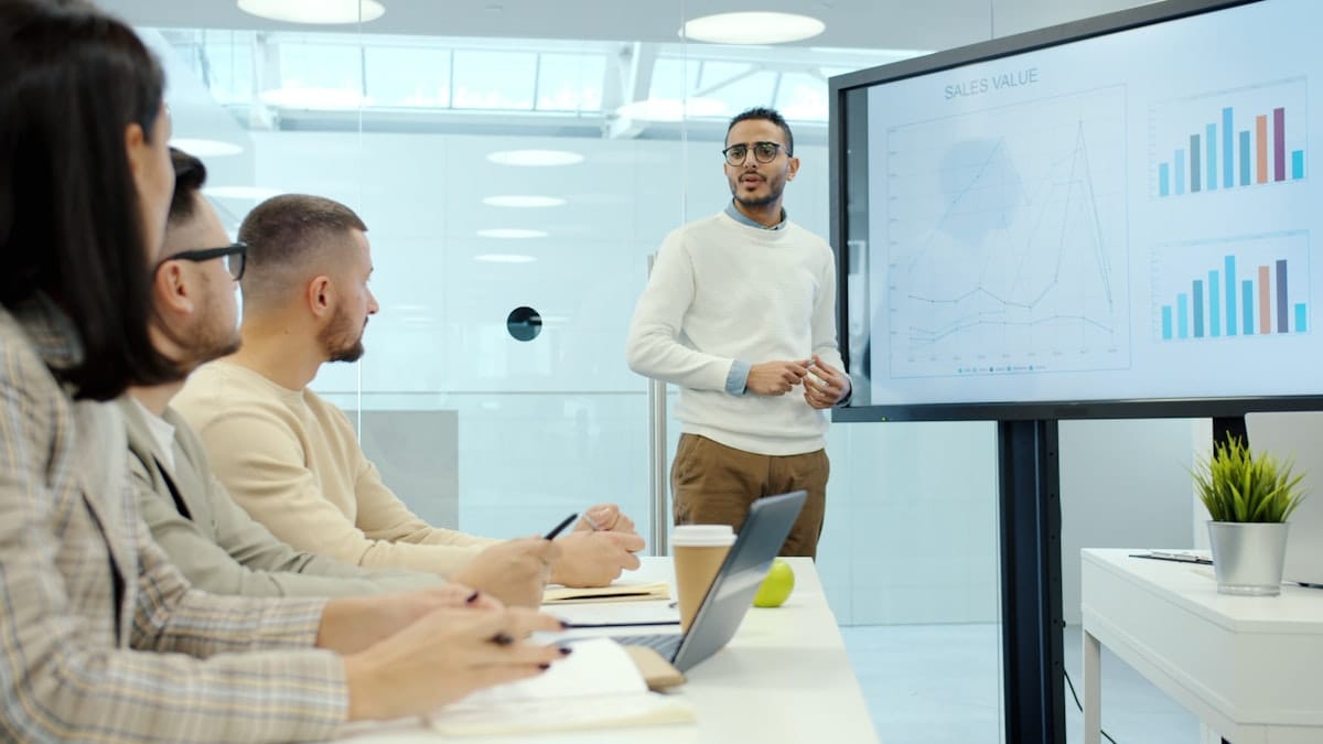 A senior leader presenting a strategy to a board: executive interviews evaluate organizational thinking, not task execution